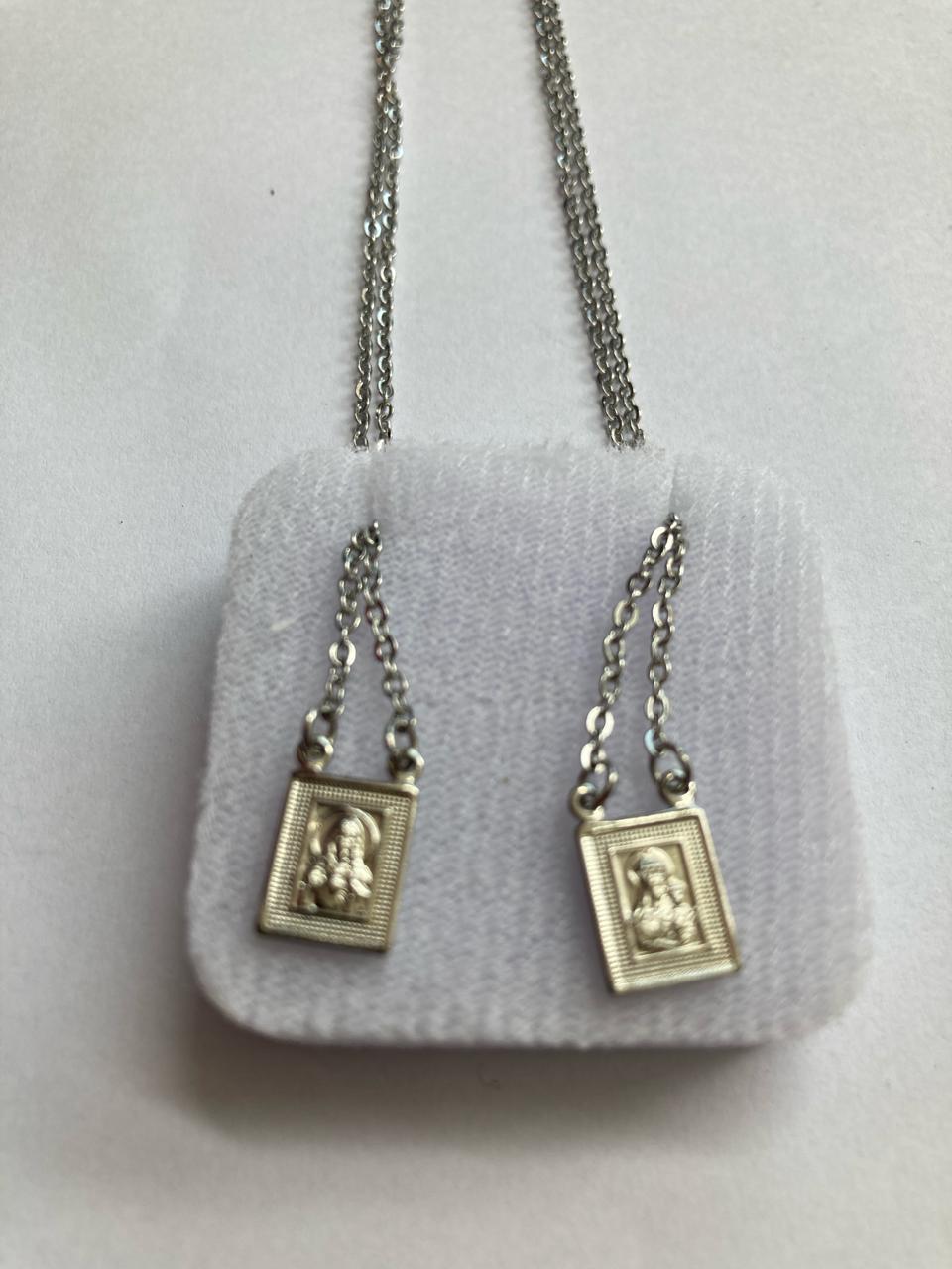 imagem de ESCAPULÁRIO AÇO INOX NOSSA SENHORA DO CARMO E SAGRADO CORAÇÃO DE JESUS