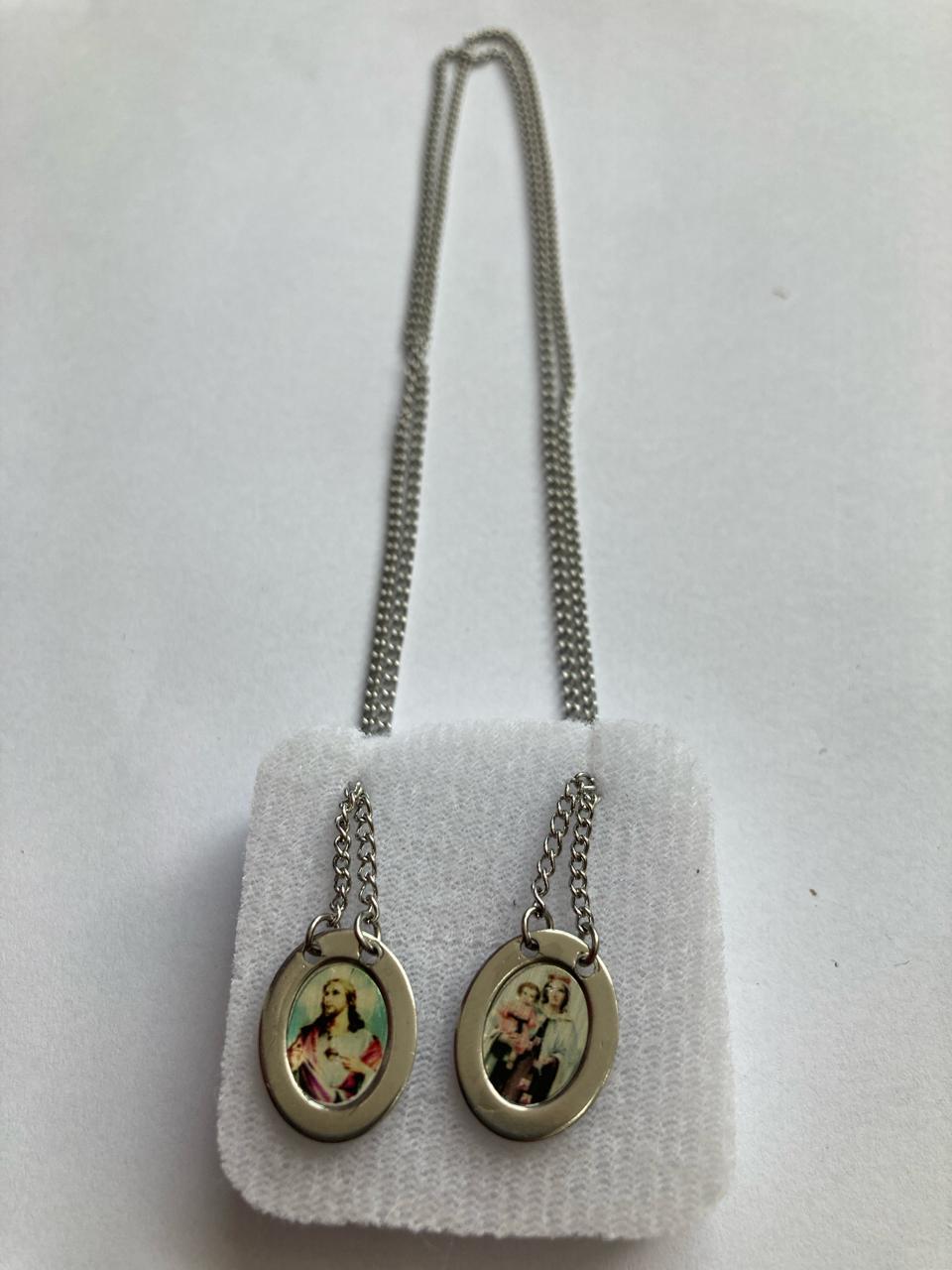 imagem de ESCAPULÁRIO AÇO INOX NOSSA SENHORA DO CARMO E SAGRADO CORAÇÃO DE JESUS OVAL