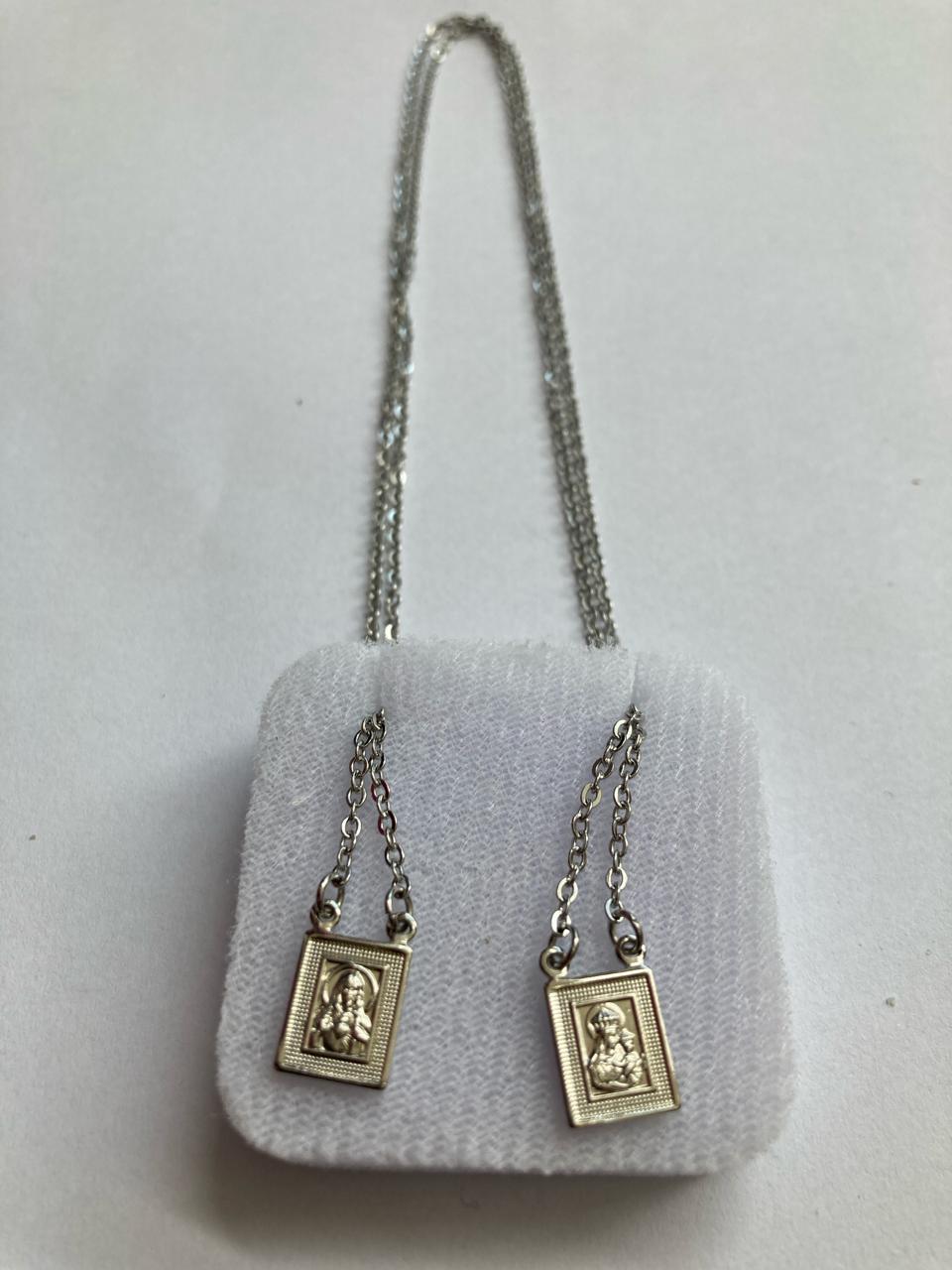 imagem de ESCAPULÁRIO AÇO INOX NOSSA SENHORA DO CARMO E SAGRADO CORAÇÃO DE JESUS